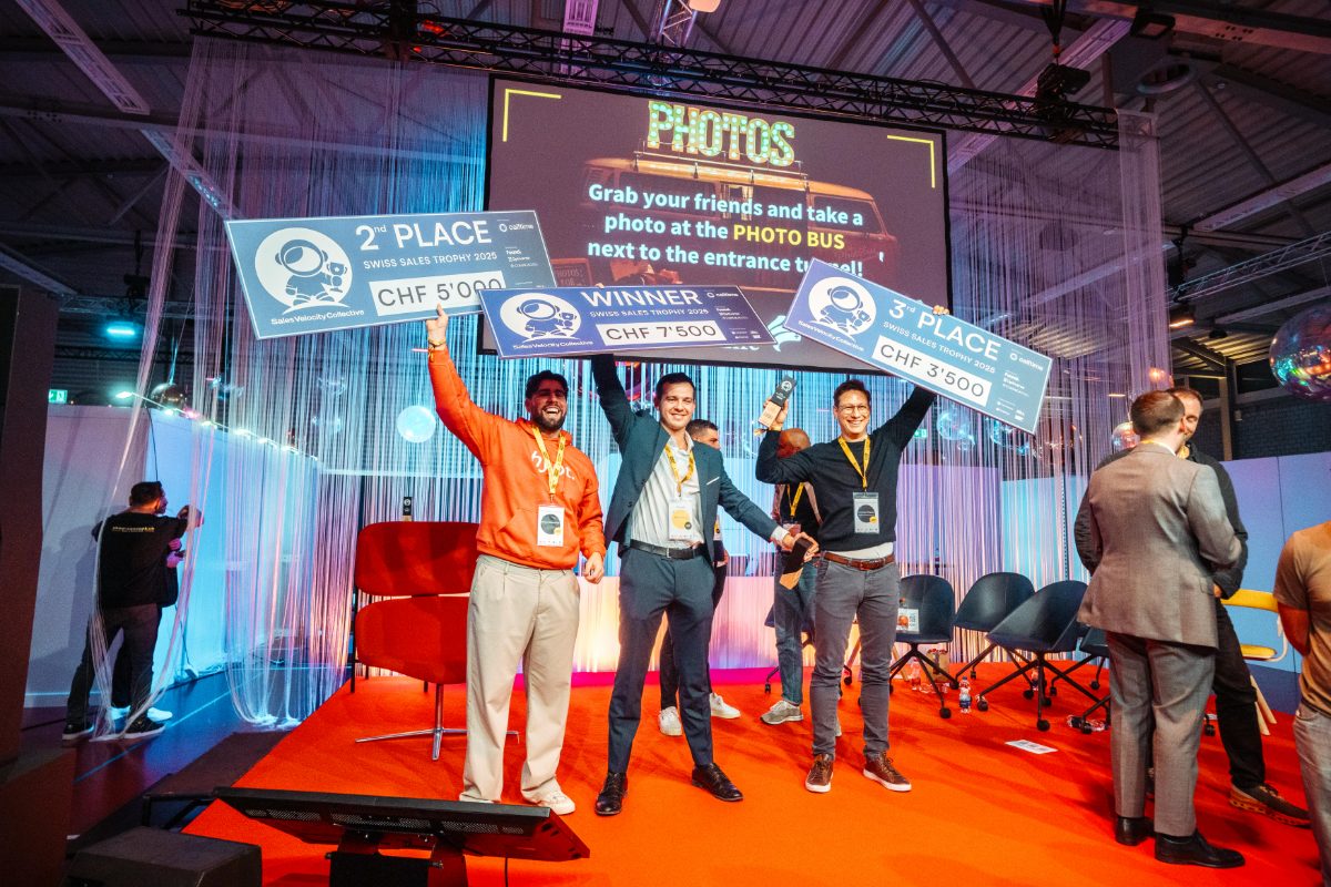 Swiss Sales Trophy 2025 winners on stage with their prize checks